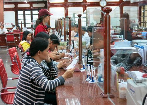 Ngân hàng thích huy động hơn cho vay ảnh 1